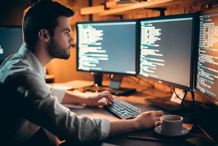 man working at computer