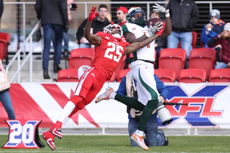 DC Defenders DB Desmond Lawrence breaks up a pass.