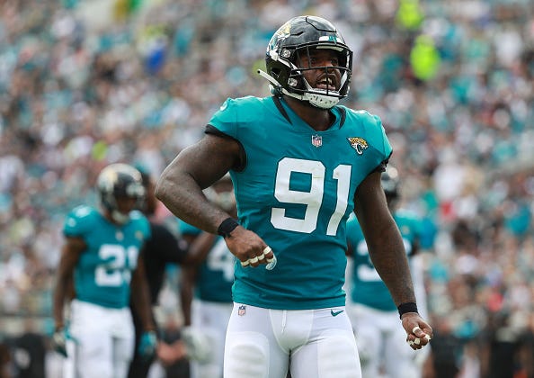 Jaguars DE Yannick Ngakoue celebrates a big play.