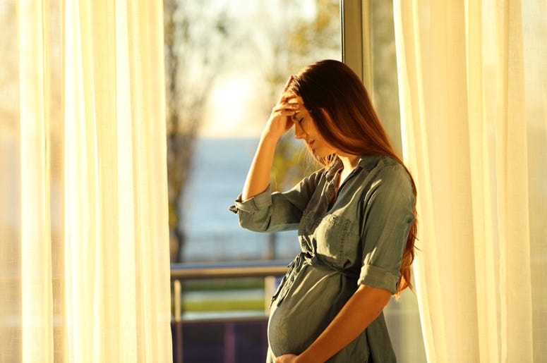 Sad Pregnant Woman