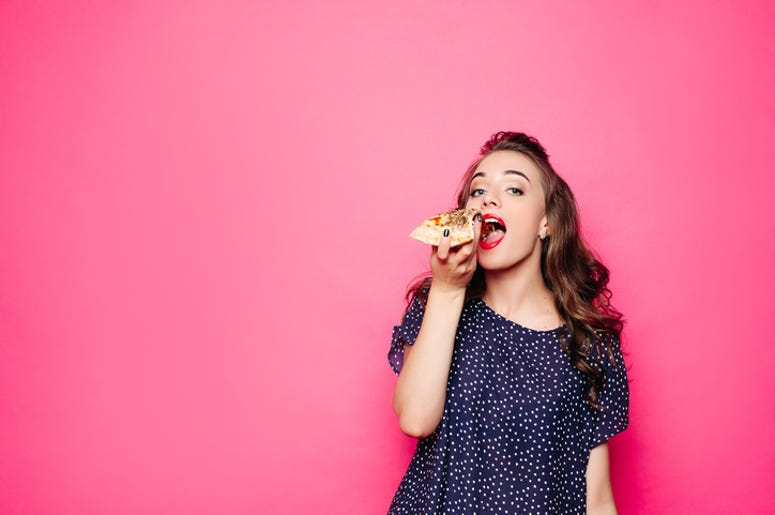 Woman Eating Pizza