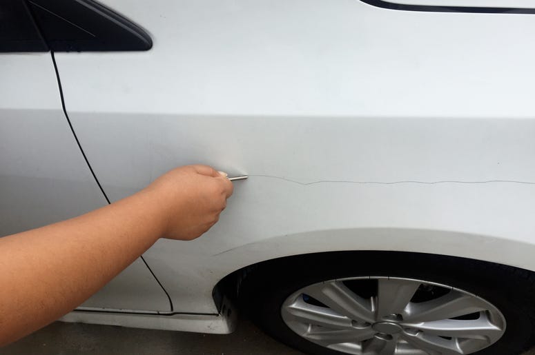 Car Getting Keyed