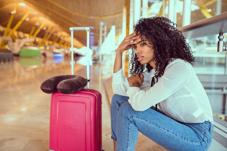 Lonely Woman in Airport