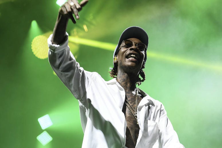 Entertainment: Wiz Khalifa performs in South Florida July 20, 2016; West Palm Beach, FL, USA; Recording artist Wiz Khalifa performs at the Perfect Vodka Amphitheatre.