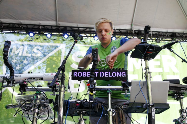 Robert DeLong performs at MLS Summer Beat before the start of a match between the Seattle Sounders FC and the Portland Timbers at CenturyLink Field. Robert DeLong performs at MLS Summer Beat before the start of a match between the Seattle Sounders FC and the Portland Timbers at CenturyLink Field.