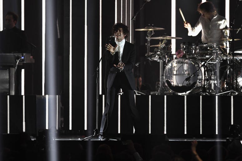 Matthew Healy performs with The 1975 on stage at The BRIT Awards 2017 Matthew Healy performs with The 1975 on stage at The BRIT Awards 2017