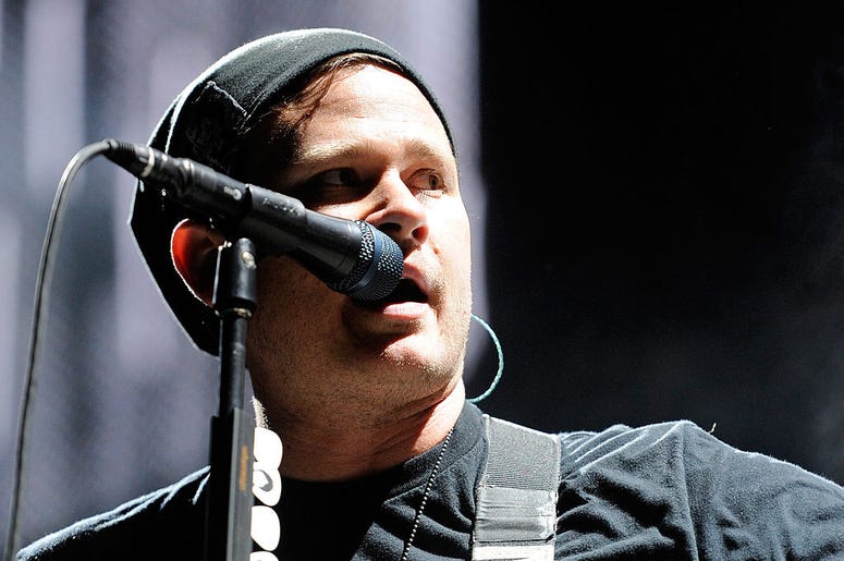 Blink-182 singer/guitarist Tom DeLonge performs at the Red Rock Casino as the band tours in support of the new album, "Neighborhoods" October 7, 2011 in Las Vegas, Nevada Blink-182 singer/guitarist Tom DeLonge performs at the Red Rock Casino as the band tours in support of the new album, "Neighborhoods" October 7, 2011 in Las Vegas, Nevada