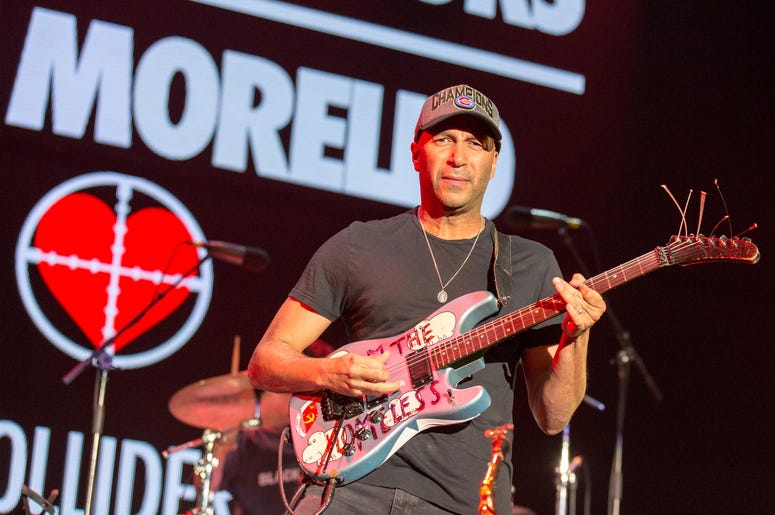 Tom Morello performs with X Ambassadors during KROQ Almost Acoustic Christmas Tom Morello performs with X Ambassadors during KROQ Almost Acoustic Christmas