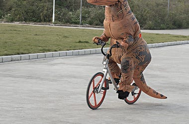 PERSON UNDER CORONAVIRUS LOCKDOWN IN SPAIN TRIES TO LEAVE HOUSE DRESSED AS T. REX