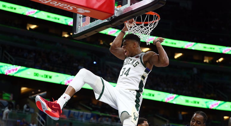Giannis soars for the slam against Orlando