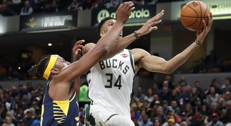 Giannis finishes over Turner