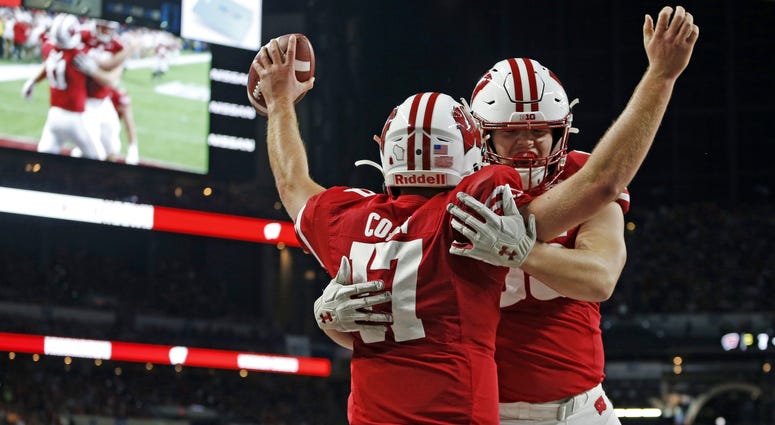 Jack Coan and Cormac Sampson celebrate a TD