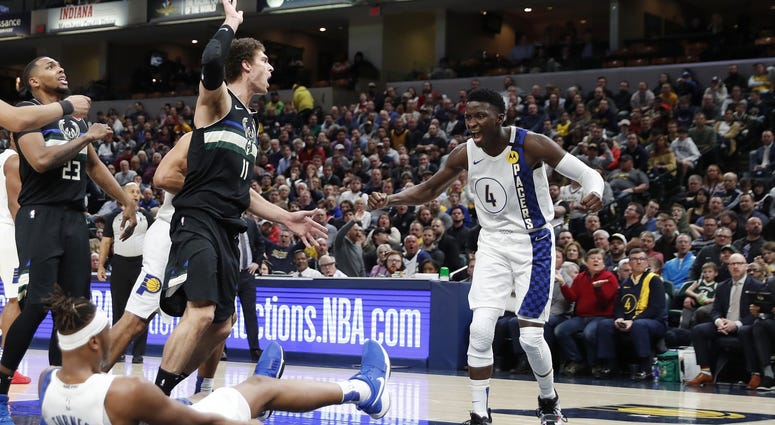 Victor Oladipo celebrates against the Bucks