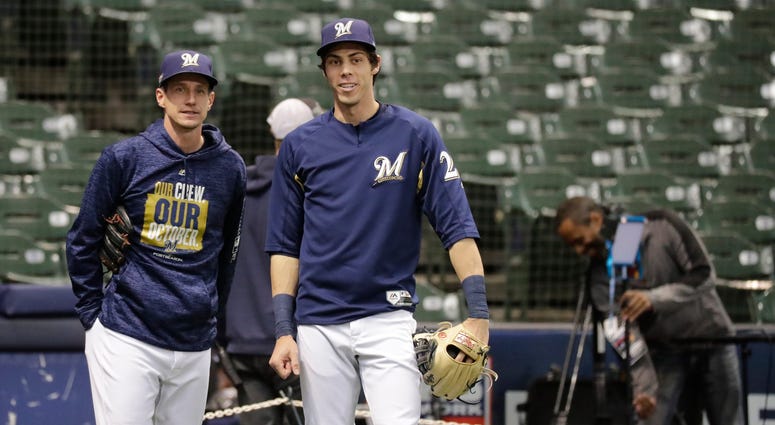 Craig Counsell and Christian Yelich
