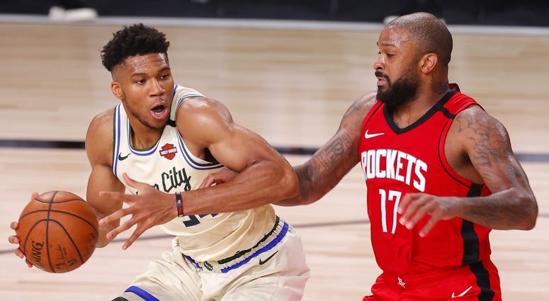 Giannis drives on PJ Tucker