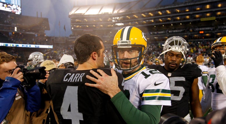 Aaron Rodgers Derek Carr
