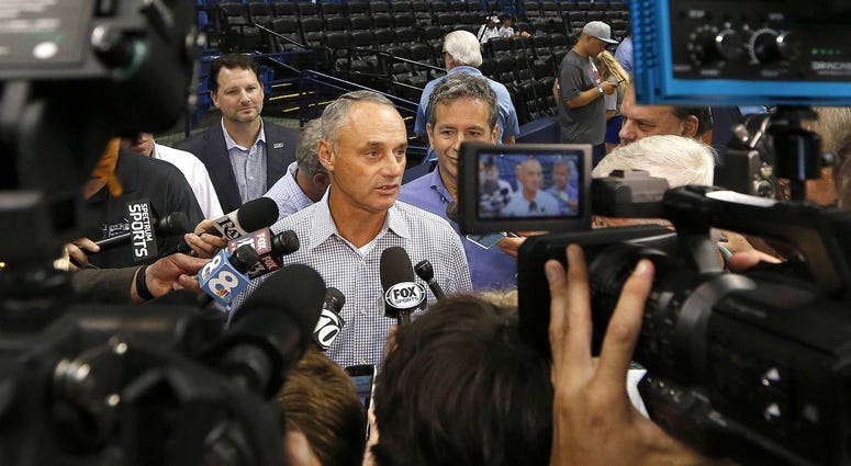Commissioner of baseball, Rob Manfred, talks prior to the game between the Tampa Bay Rays and Toronto Blue Jays at Tropicana Field. MLB: Toronto Blue Jays at Tampa Bay Rays