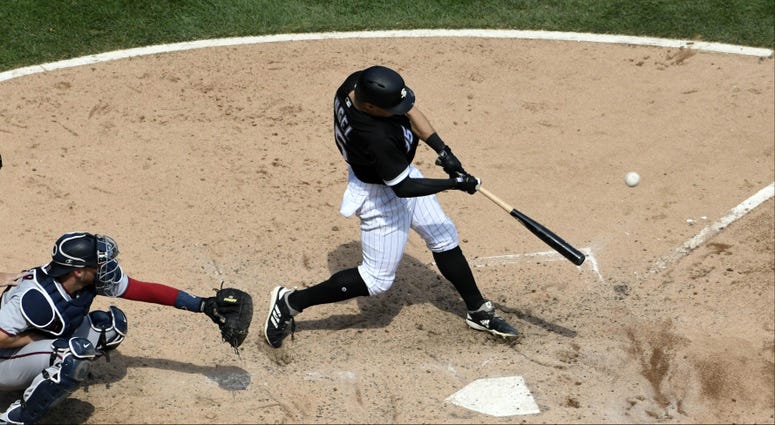 Aug 22, 2018; Chicago, IL, USA; Chicago White Sox center fielder Adam Engel (15) hits a two run home run against the Minnesota Twins during the fifth inning at Guaranteed Rate Field. MLB: Minnesota Twins at Chicago White Sox