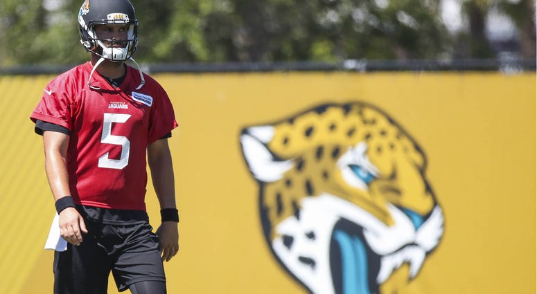 Jacksonville Jaguars quarterback Blake Bortles (5) looks on during organized team activities at Everbank Field. NFL: Jacksonville Jaguars-OTA