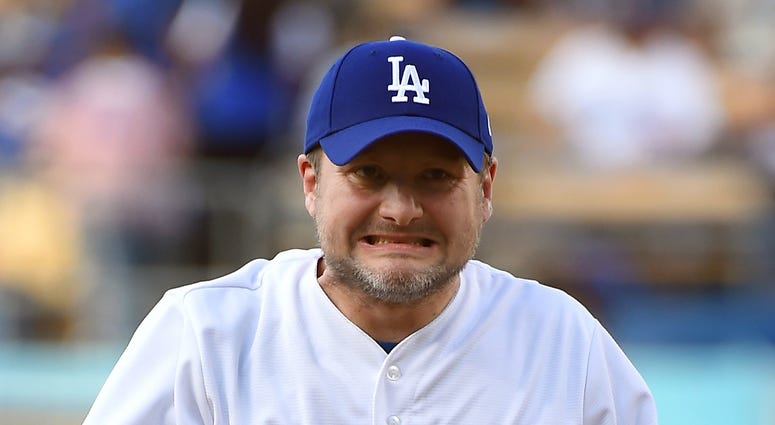 Movie director Rian Johnson throws out the first pitch before the game between the Los Angeles Dodgers and the Kansas City Royals at Dodger Stadium. MLB: Kansas City Royals at Los Angeles Dodgers
