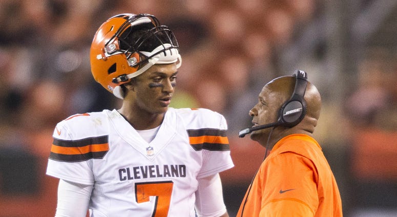 Cleveland Browns head coach Hue Jackson talks with Cleveland Browns quarterback DeShone Kizer (7) during a time out in the fourth quarter against the New Orleans Saints at FirstEnergy Stadium. NFL: New Orleans Saints at Cleveland Browns