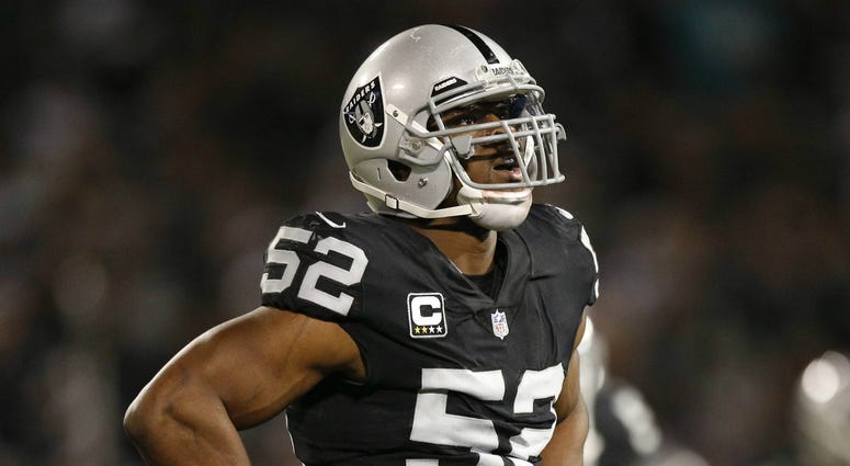 Oakland Raiders defensive end Khalil Mack (52) stands on the field during a break in the action against the Dallas Cowboys in the second quarter at Oakland Coliseum. NFL: Dallas Cowboys at Oakland Raiders