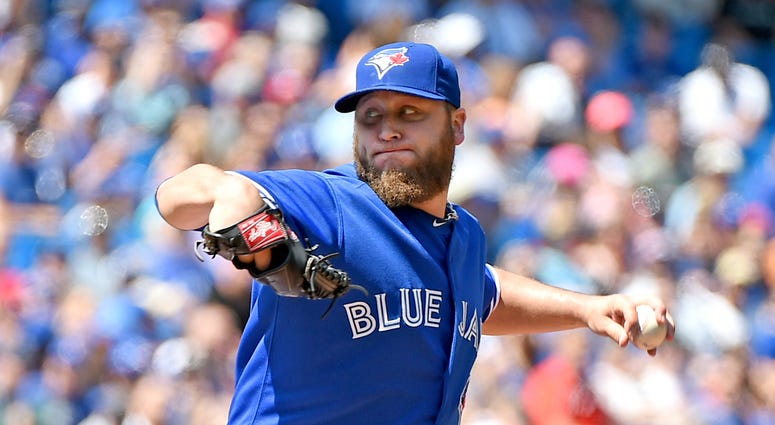 Mark Buehrle throws a pitch