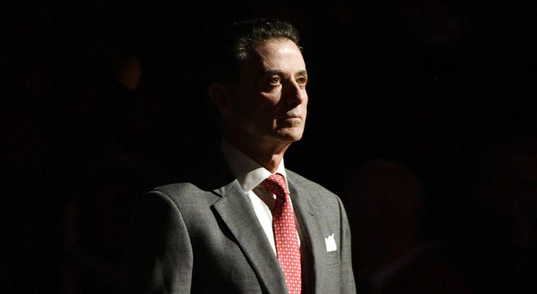 Louisville Cardinals head coach Rick Pitino watches the player introductions before the first half against the William & Mary Tribe at KFC Yum! Center. NCAA Basketball: William & Mary at Louisville