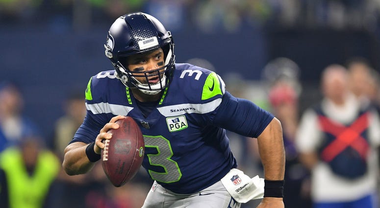 Russell Wilson Seattle Seahawks Dallas Cowboys NFL Wild Card