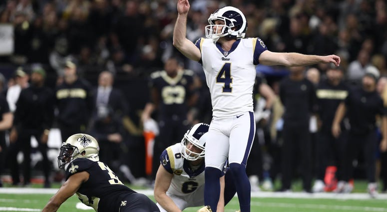 Los Angeles Rams kicker Greg Zuerlein (4) kicks the game-winning field goal against the New Orleans Saints during overtime in the NFC Championship game at Mercedes-Benz Superdome Los Angeles Rams kicker Greg Zuerlein (4) kicks the game-winning field goal against the New Orleans Saints during overtime in the NFC Championship game at Mercedes-Benz Superdome