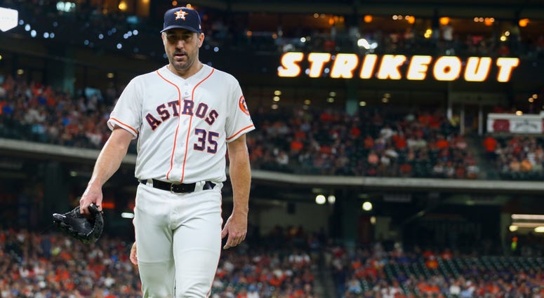 Houston Astros starting pitcher Justin Verlander (35) walks to the dugout after recording a strike out during the second inning against the Tampa Bay Rays at Minute Maid Park Houston Astros starting pitcher Justin Verlander (35) walks to the dugout after recording a strike out during the second inning against the Tampa Bay Rays at Minute Maid Park