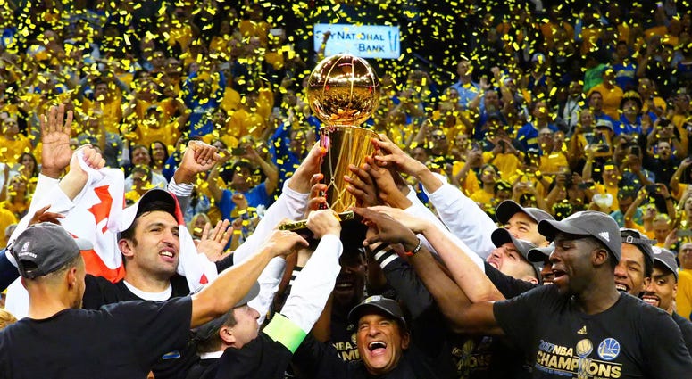 The Golden State Warriors celebrate beating the Cleveland Cavaliers in game five of the 2017 NBA Finals at Oracle Arena. NBA: Finals-Cleveland Cavaliers at Golden State Warriors
