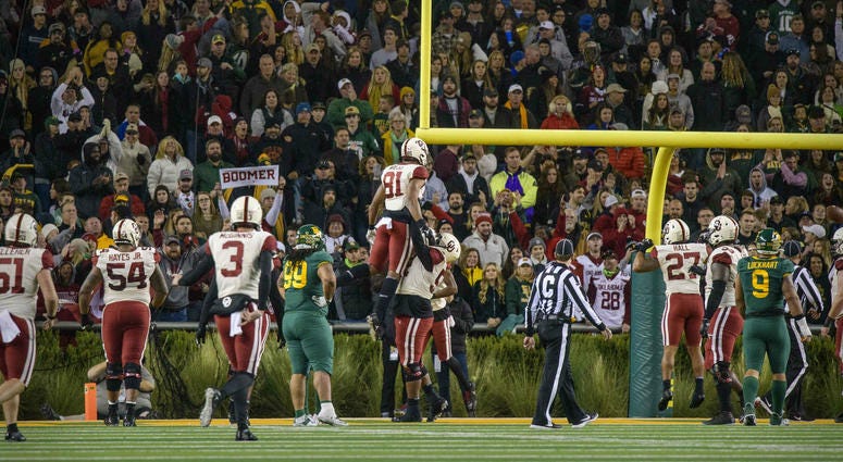 Nov 16, 2019; Waco, TX, USA; The Oklahoma Sooners celebrate the game tying touchdown by Oklahoma Sooners fullback Brayden Willis (81) against the Baylor Bears during the second half at McLane Stadium Nov 16, 2019; Waco, TX, USA; The Oklahoma Sooners celebrate the game tying touchdown by Oklahoma Sooners fullback Brayden Willis (81) against the Baylor Bears during the second half at McLane Stadium
