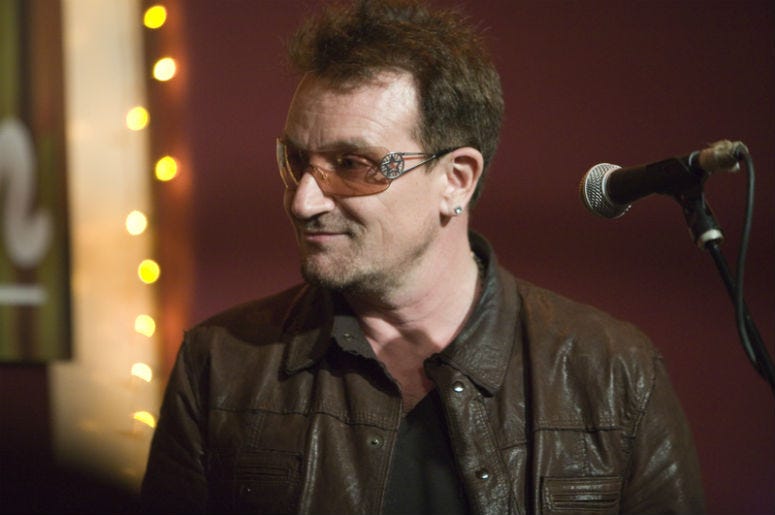 Bono came down to the The Living Room in New York to sing a song with his fellow songwriter Glen Hansard, last Tuesday May 8th. They both sang “The Auld Triangle”—a modern Irish anthem written in the early ’60s by Dominic Behan. Bono came down to the The Living Room in New York to sing a song with his fellow songwriter Glen Hansard, last Tuesday May 8th. They both sang “The Auld Triangle”—a modern Irish anthem written in the early ’60s by Dominic Behan.