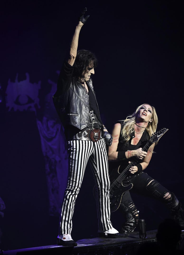 Alice Cooper preforming Alice Cooper performing with Nita Strauss