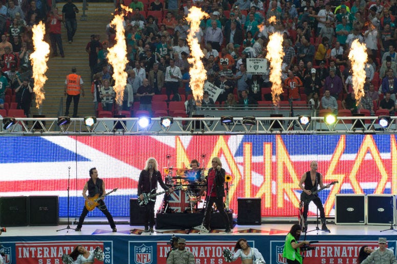 Def Leppard perform in the pre game show before the game between the Miami Dolphins and the Oakland Raiders at Wembley Stadium Def Leppard perform in the pre game show before the game between the Miami Dolphins and the Oakland Raiders at Wembley Stadium