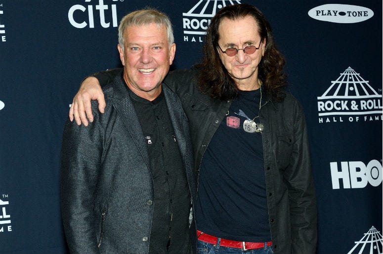 Alex Lifeson and Geddy Lee of Rush attend the Press Room at the 32nd Annual Rock & Roll Hall of Fame Induction Ceremony at the Barclays Center in Brooklyn, NY Alex Lifeson and Geddy Lee of Rush attend the Press Room at the 32nd Annual Rock & Roll Hall of Fame Induction Ceremony at the Barclays Center in Brooklyn, NY