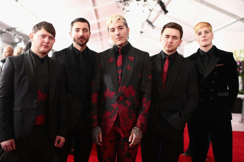 Guitarist Lee Malia, Keyboardist Jordan Fish, lead vocalist Oliver Sykes, drummer Matt Nicholls, and bassist Matt Kean of rock band 'Bring Me The Horizon' attend the 61st Annual GRAMMY Awards Guitarist Lee Malia, Keyboardist Jordan Fish, lead vocalist Oliver Sykes, drummer Matt Nicholls, and bassist Matt Kean of rock band 'Bring Me The Horizon' attend the 61st Annual GRAMMY Awards