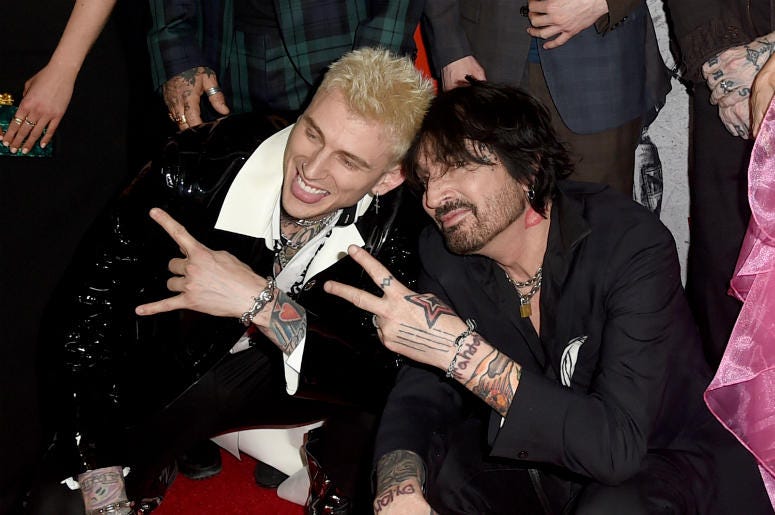 Colson Baker (L) and Tommy Lee arrive at the premiere of Netflix's 'The Dirt' at ArcLight Hollywood Colson Baker (L) and Tommy Lee arrive at the premiere of Netflix's 'The Dirt' at ArcLight Hollywood