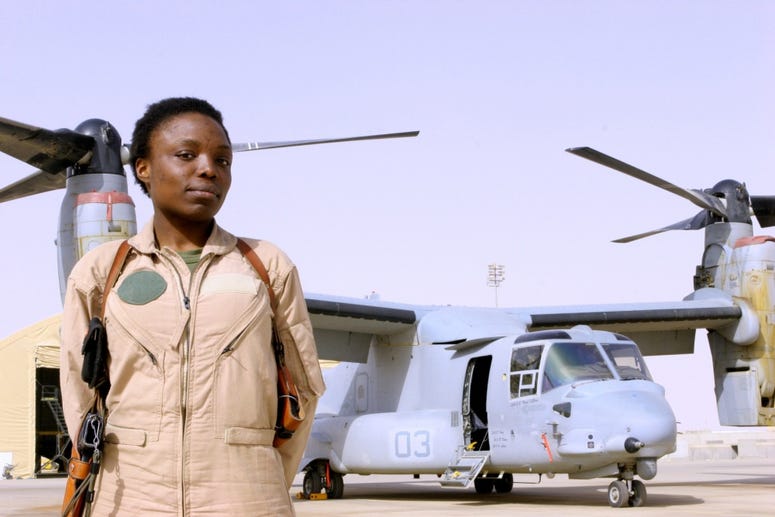 Capt. Elizabeth A. Okoreeh-Baah, the first female MV-22 Osprey pilot, stands on the flight line after a combat operation March 12, 2008. Baah