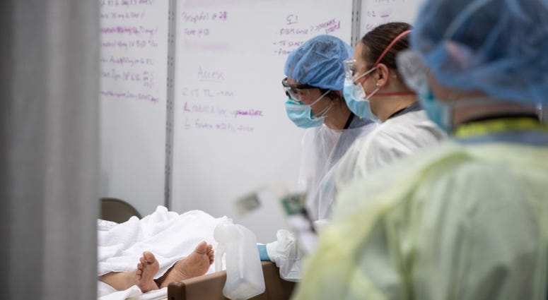U.S. Army service members from the 531st field hospital, deployed from Fort Campbell, Kentucky, perform patient care in the Intensive Care Unit at the Javits New York Medical Station. Coronavirus