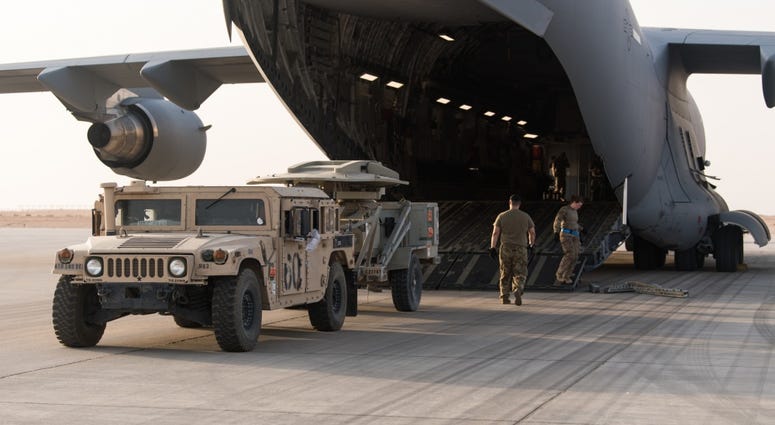 A High Mobility Multipurpose Wheeled vehicle is offloaded from a U.S. Air Force C-17 Globe-master III, Prince Sultan Air Base, Kingdom off Saudi Arabia, June, 29, 2019. USinSaudiArabia