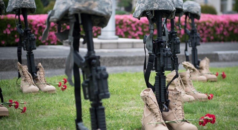 Battlefield Crosses represent fallen Security Forces and Air Force Office of Special Investigations members during a Police Week Memorial Ceremony, May 18, 2018, at Yokota Air Base, Japan. BattlefieldCross