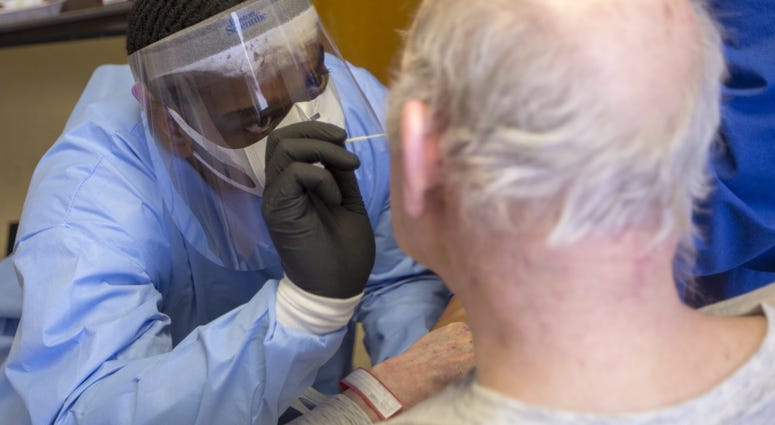 U.S. Army Pfc. Alandes T. Rowsey, a combat medic specialist assigned to the 223rd Engineer Battalion, Mississippi National Guard, administers a COVID-19 test at the Mississippi State Veterans Home in Kosciusko, Miss., May 15, 2020. U.S. Army Pfc. Alandes T. Rowsey, a combat medic specialist assigned to the 223rd Engineer Battalion, Mississippi National Guard, administers a COVID-19 test at the Mississippi State Veterans Home in Kosciusko, Miss., May 15, 2020.