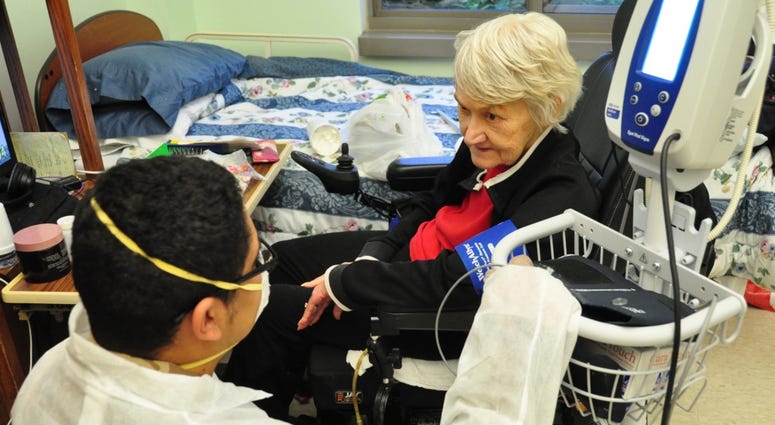 U.S. Army Spc. Jabari Ashanti, a Combat Medic with the 1st Battalion, 114th Infantry Regiment, New Jersey Army National Guard (NJARNG), checks a resident’s blood pressure at the New Jersey Veterans Memorial Home at Menlo Park in Edison, N.J., April 2020. U.S. Army Spc. Jabari Ashanti, a Combat Medic with the 1st Battalion, 114th Infantry Regiment, New Jersey Army National Guard (NJARNG), checks a resident’s blood pressure at the New Jersey Veterans Memorial Home at Menlo Park in Edison, N.J., April 2020.