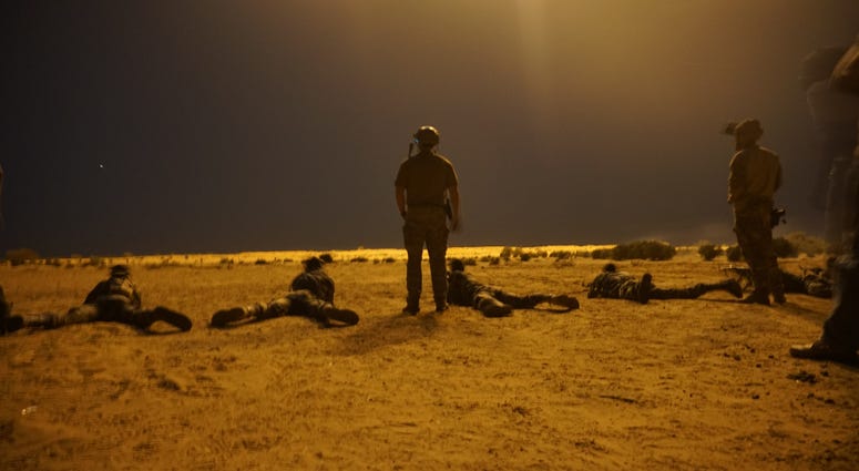 Nigerien army soldiers shoot targets under 60mm illumination mortar rounds as a part of Exercise Flintlock 2017 in Diffa, Niger, March 9, 2017. Nigerien army soldiers shoot targets under 60mm illumination mortar rounds as a part of Exercise Flintlock 2017 in Diffa, Niger, March 9, 2017.