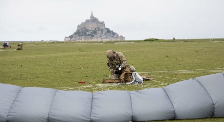 U.S Army Special Forces commemorate WWII with jump into Mont Saint-Michel, Normandy, France. U.S Army Special Forces commemorate WWII with jump into Mont Saint-Michel, Normandy, France.