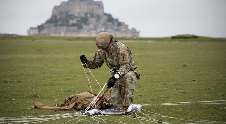 U.S Army Special Forces commemorate WWII with jump into Mont Saint-Michel, Normandy, France. U.S Army Special Forces commemorate WWII with jump into Mont Saint-Michel, Normandy, France.
