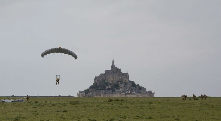 U.S Army Special Forces commemorate WWII with jump into Mont Saint-Michel, Normandy, France. U.S Army Special Forces commemorate WWII with jump into Mont Saint-Michel, Normandy, France.
