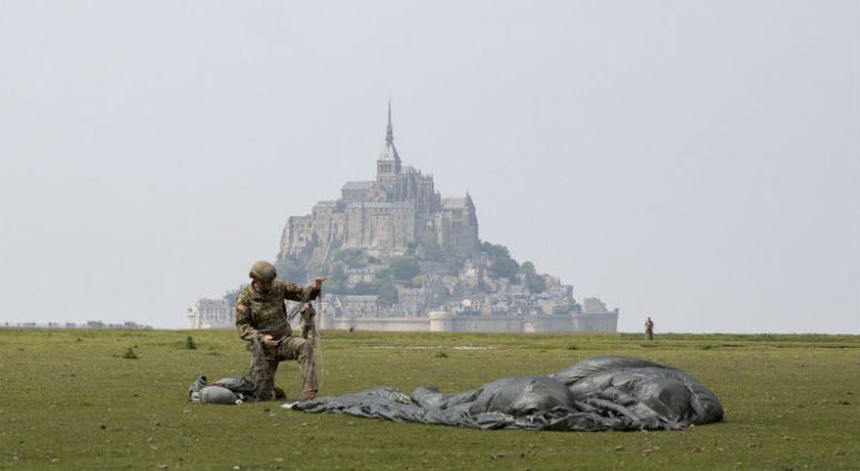 U.S Army Special Forces commemorate WWII with jump into Mont Saint-Michel, Normandy, France. U.S Army Special Forces commemorate WWII with jump into Mont Saint-Michel, Normandy, France.